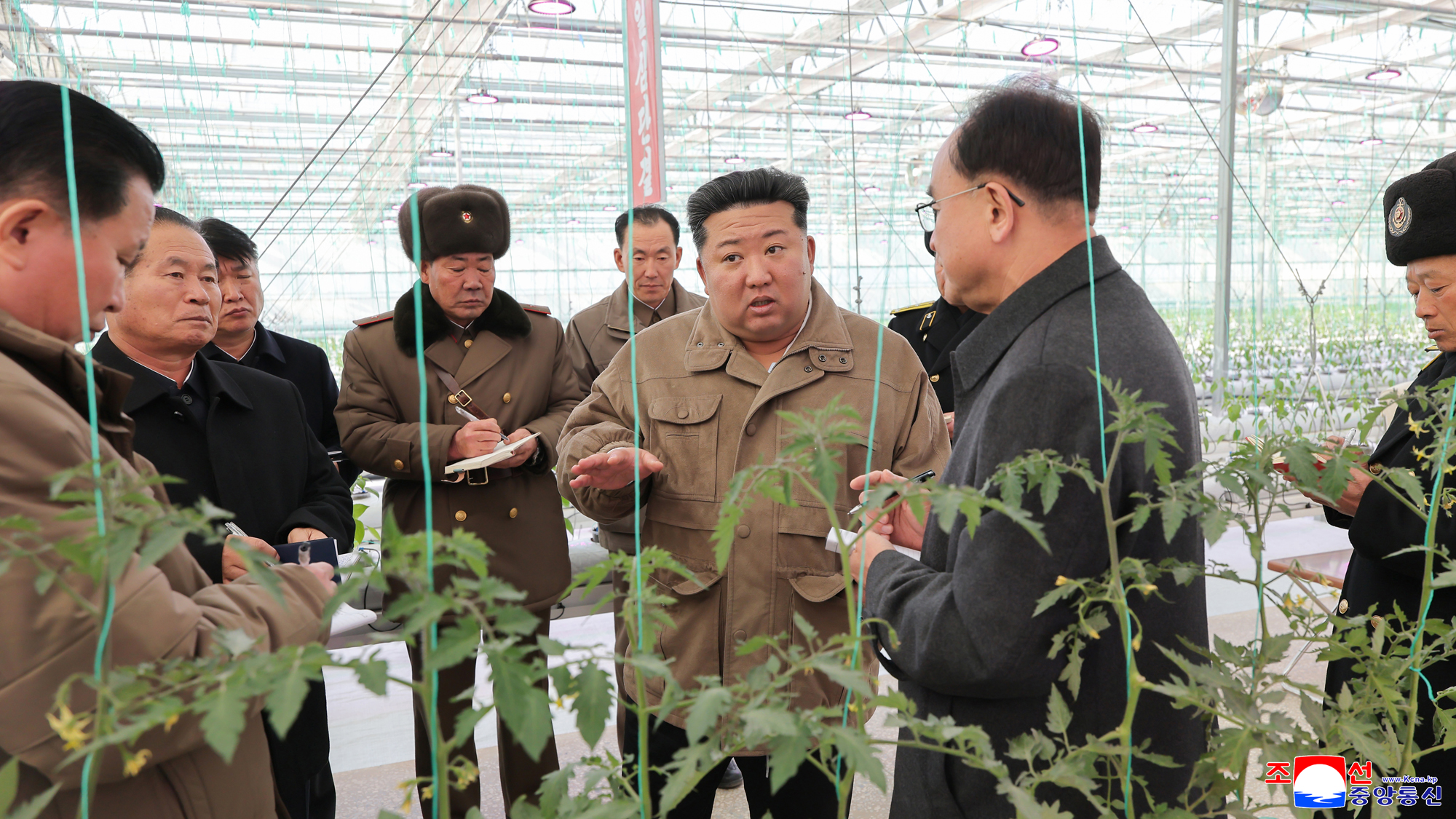 Respected Comrade Kim Jong Un gives field guidance at construction site of Sinuiju Combined Greenhouse Farm nearing completion 