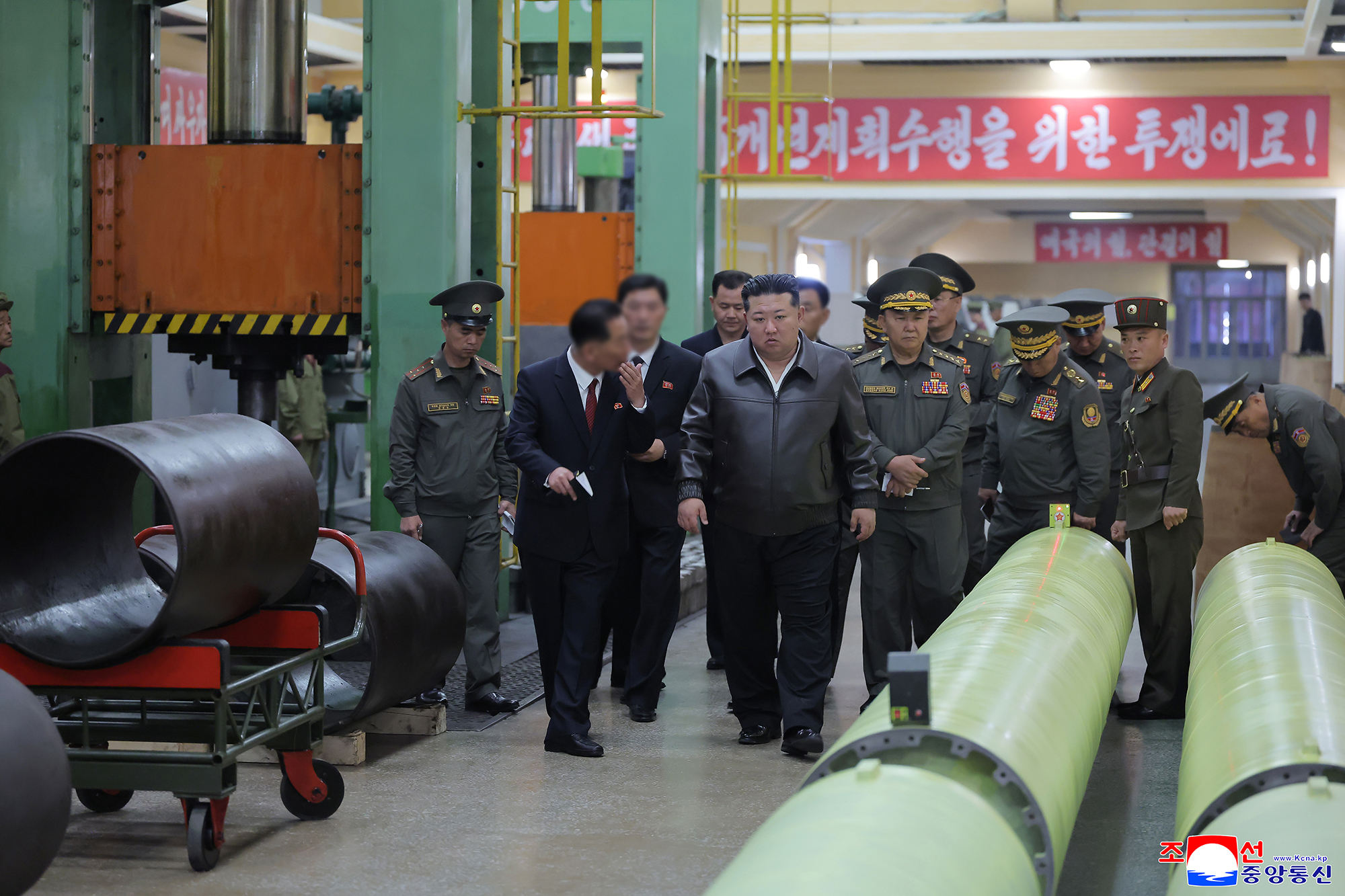 Respected Comrade Kim Jong Un inspects munitions industry enterprises